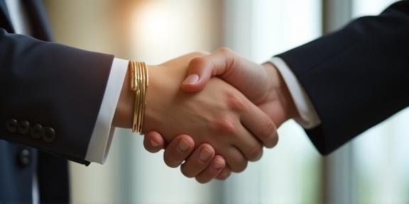 Business handshake symbolizing HR partnership